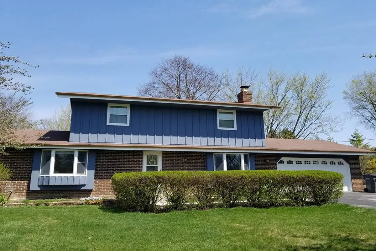 Home exterior after a blue repaint